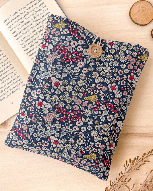 Blue padded cotton book sleeve with flowers